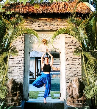 A person standing in a yoga pose